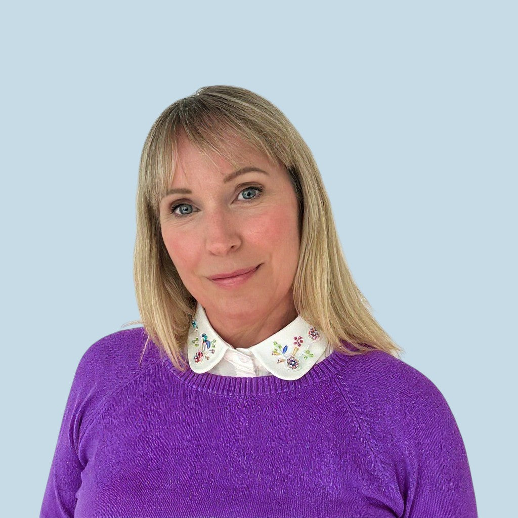 Simply Collars white Peter Pan collar with colourful floral beadwork. Adds polish to any outfit.
