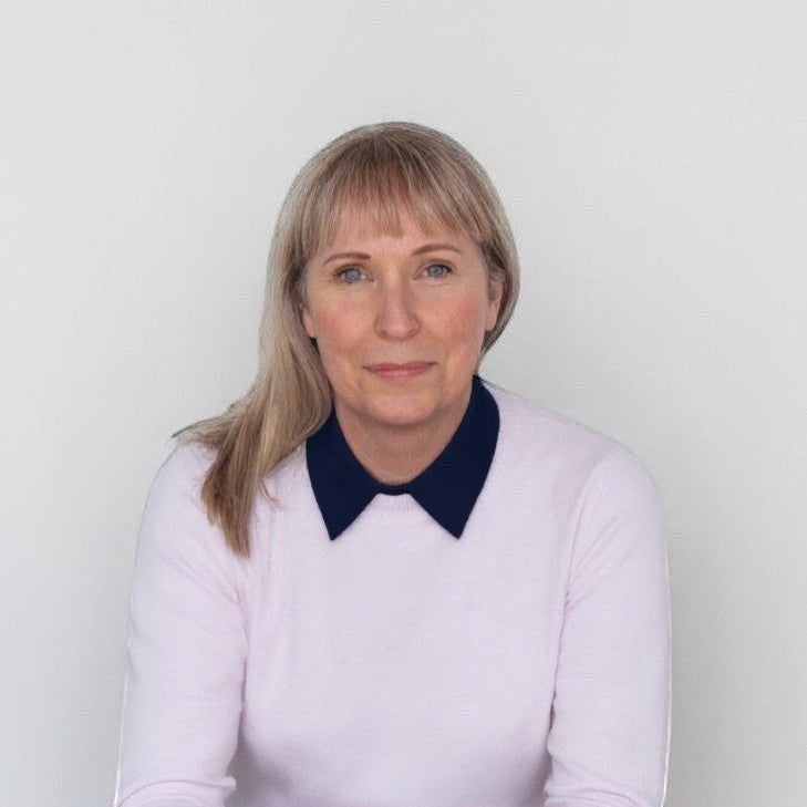 Simply Collars navy blue cotton detachable collar worn under a pink sweater for a layered look.