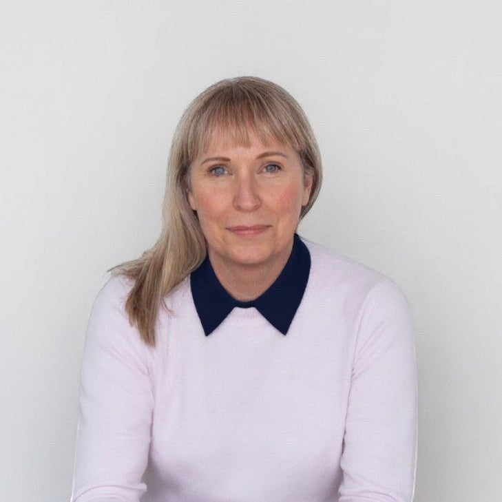 Simply Collars navy blue cotton detachable collar worn under a pink sweater for a layered look.