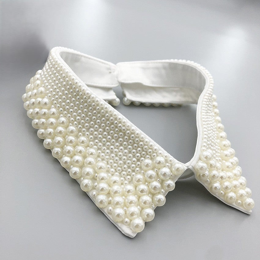 Simply Collars white detachable collar adorned with faux pearls. Adds sophisticated charm to any outfit.