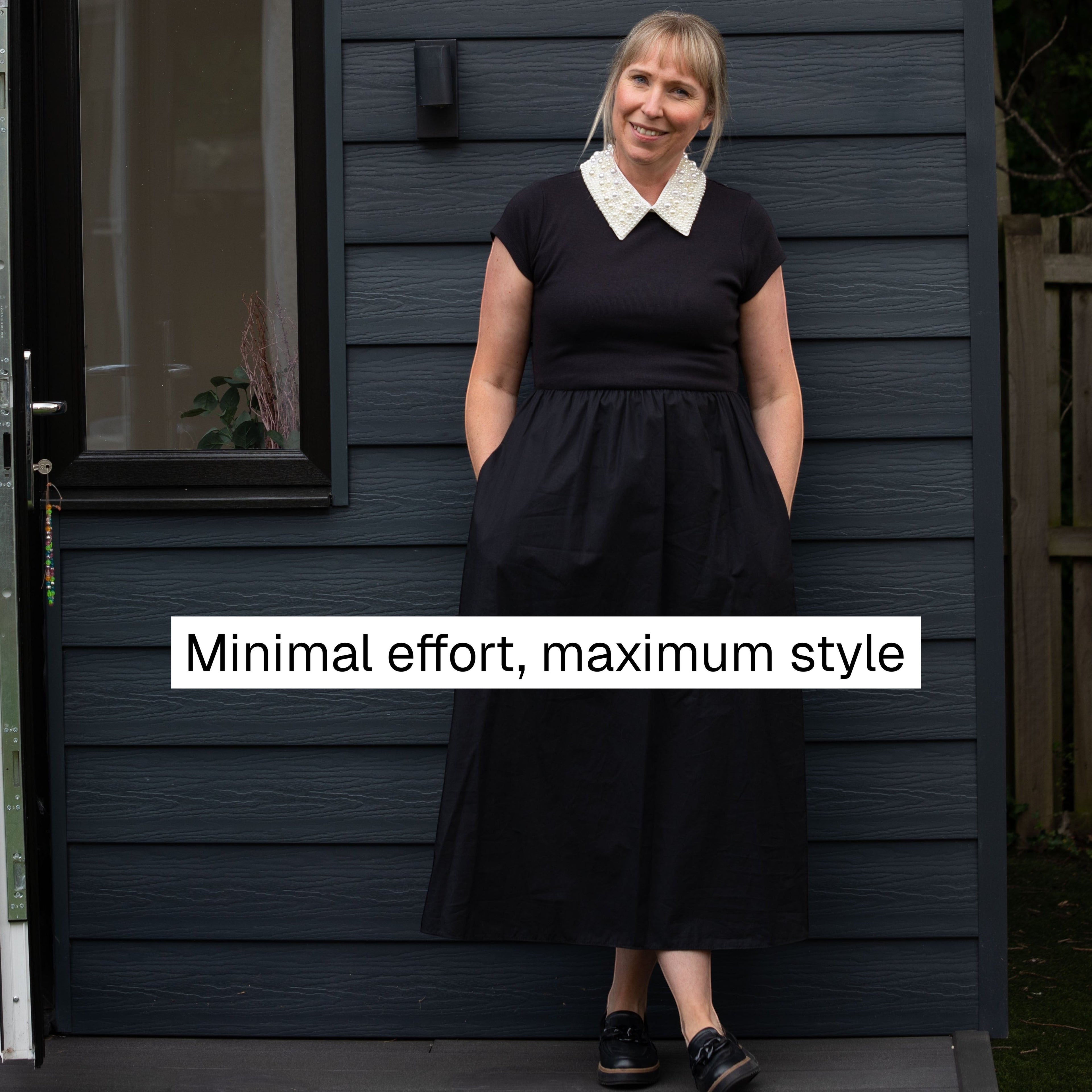 Simply Collars white detachable collar with faux pearl embellishments worn by a woman in a black dress.