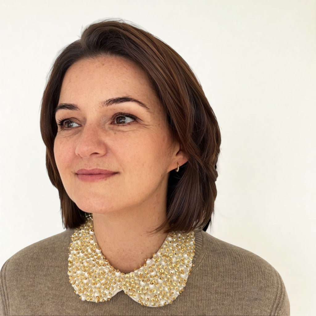 Simply Collars Petra Pan detachable champagne collar with pearls and crystals, worn over a brown sweater.