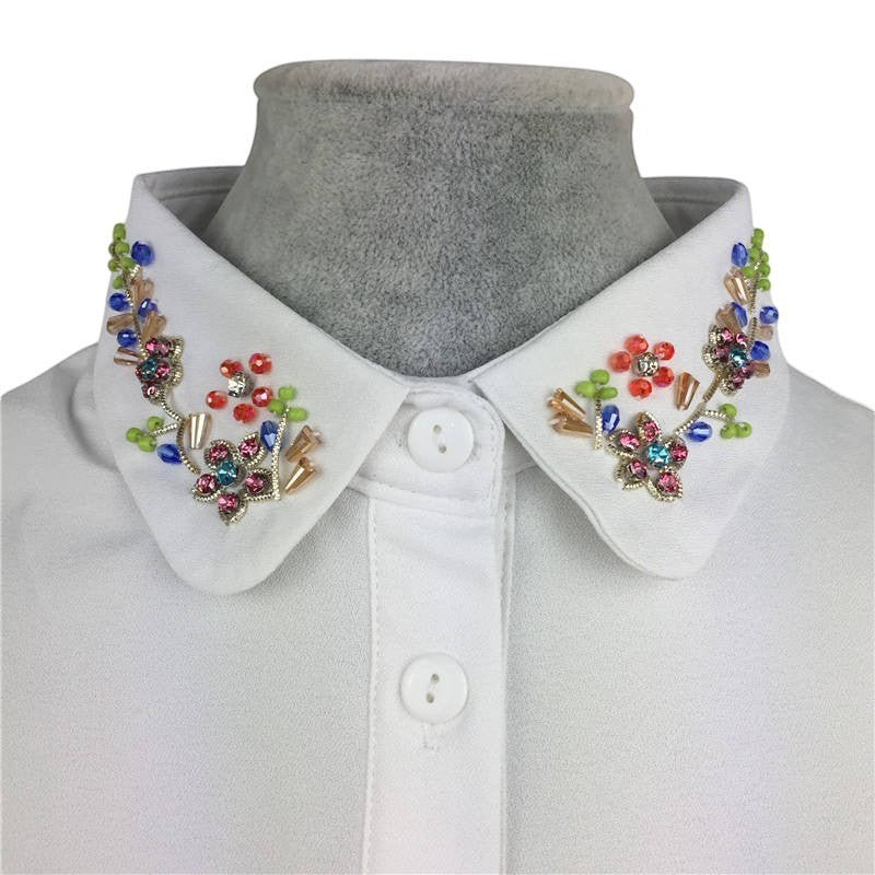 Simply Collars white detachable collar with vibrant floral beadwork and crystal embellishments.